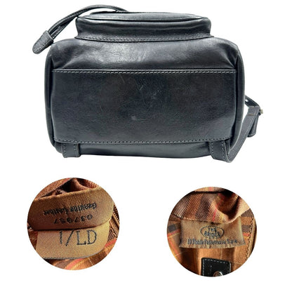 Base e codici di uno zaino The Bridge in cuoio nero con parti metalliche argentate. Cinghie delle bretelle regolabili. Completo di dustbag.