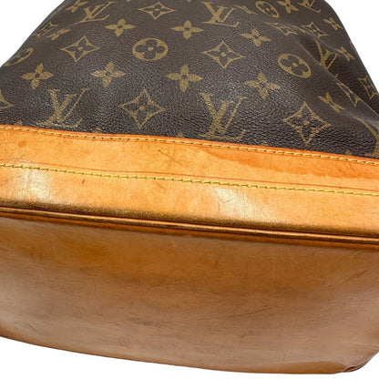 Secchiello Noé Louis Vuitton in canvas marrone monogram con finiture in vacchetta naturale, tracolla regolabile con fibbia e parti metalliche dorate. Completo di corredo, di lusso, originale, ottime condizioni. 