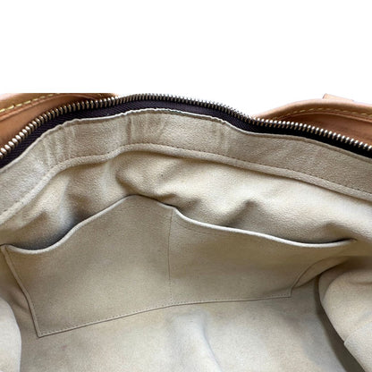 interno Borsa Louis Vuitton in canvas marrone monogram con finiture in vacchetta naturale e parti metalliche dorate; munita di doppi manici, da portare a spalla, di lusso, originale, ottime condizioni, usata.  