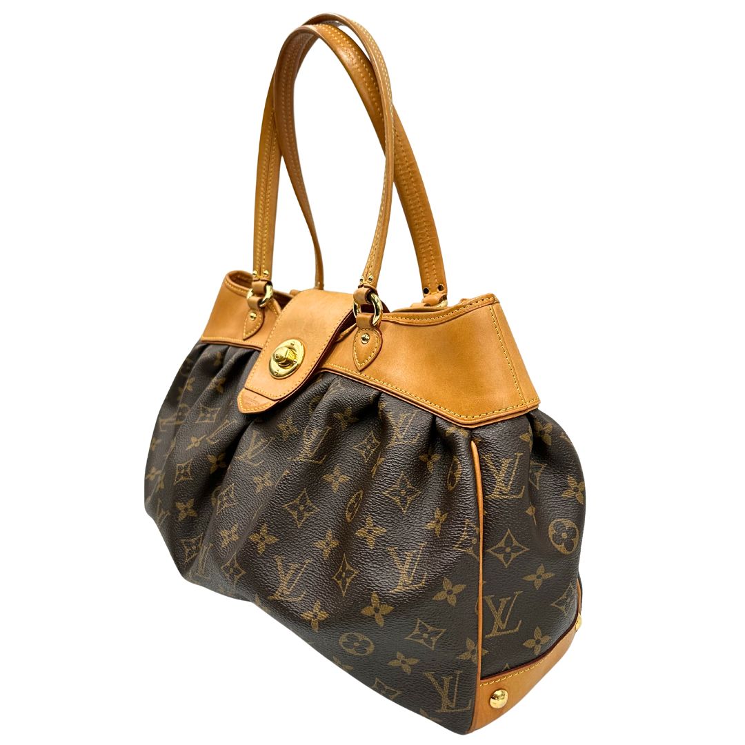 lato Borsa Louis Vuitton in canvas marrone monogram con finiture in vacchetta naturale e parti metalliche dorate; munita di doppi manici, da portare a spalla, di lusso, originale, ottime condizioni, usata.  