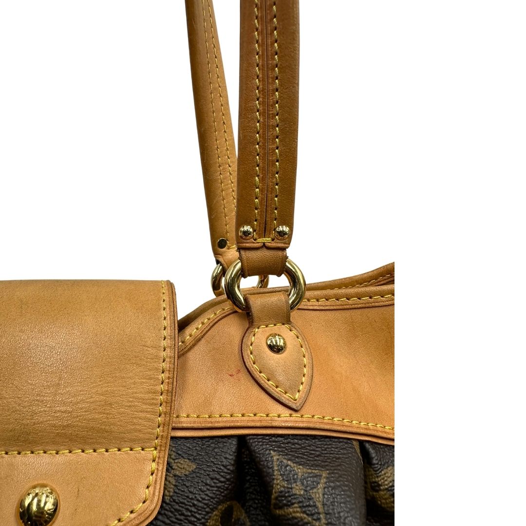 manici Borsa Louis Vuitton in canvas marrone monogram con finiture in vacchetta naturale e parti metalliche dorate; munita di doppi manici, da portare a spalla, di lusso, originale, ottime condizioni, usata.  