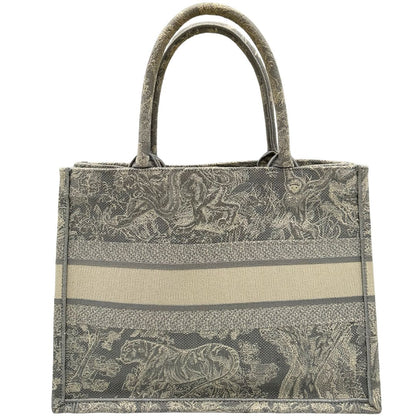 Retro di una borsa tote CD in tessuto grigio e écru con ricamo Toile De Jouy. Da indossare a mano. Completa di dustbag.