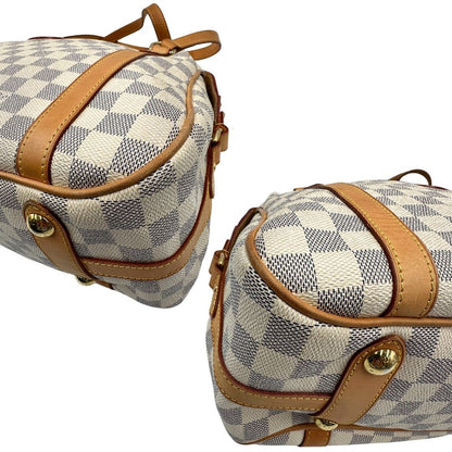 Angoli Borsa Louis Vuitton in canvas bianco Damier Azur con parti metalliche dorate e finiture in vacchetta naturale; munita di doppi manici, da portare a spalla. Originale, usata, di lusso, in ottime condizioni