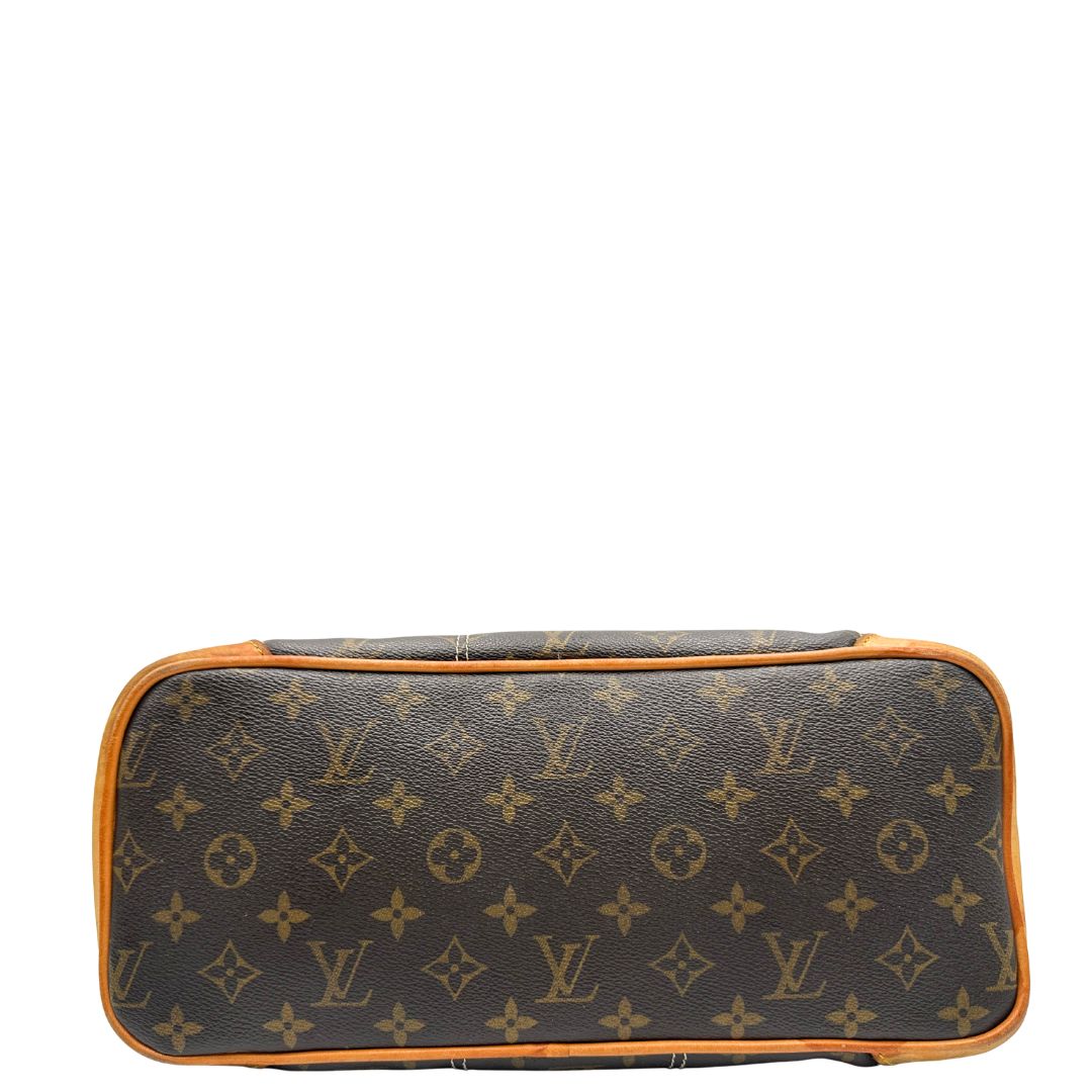 Base di una Borsa Louis Vuitton in canvas marrone monogram con cuciture decorative e finiture in vacchetta naturale. Parti metalliche dorate; munita di doppi manici, indossabile a spalla. Originale, usata, di lusso in ottime condizioni