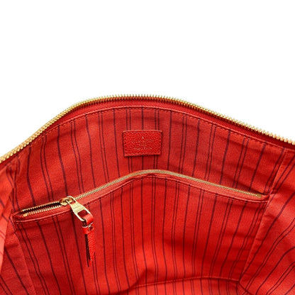 interno Borsa Louis Vuitton pelle color rosso aranciato monogram Empreinte con parti metalliche dorate; munita di doppi manici e una tracolla amovibile e regolabile. Completa di lucchetto e chiavi, di lusso, originale, ottime condizioni.  