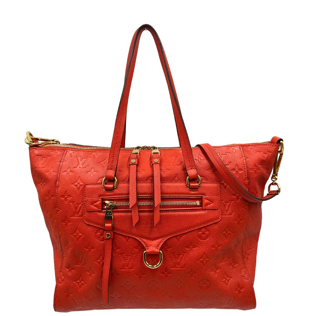 front Borsa Louis Vuitton pelle color rosso aranciato monogram Empreinte con parti metalliche dorate; munita di doppi manici e una tracolla amovibile e regolabile. Completa di lucchetto e chiavi, di lusso, originale, ottime condizioni. 