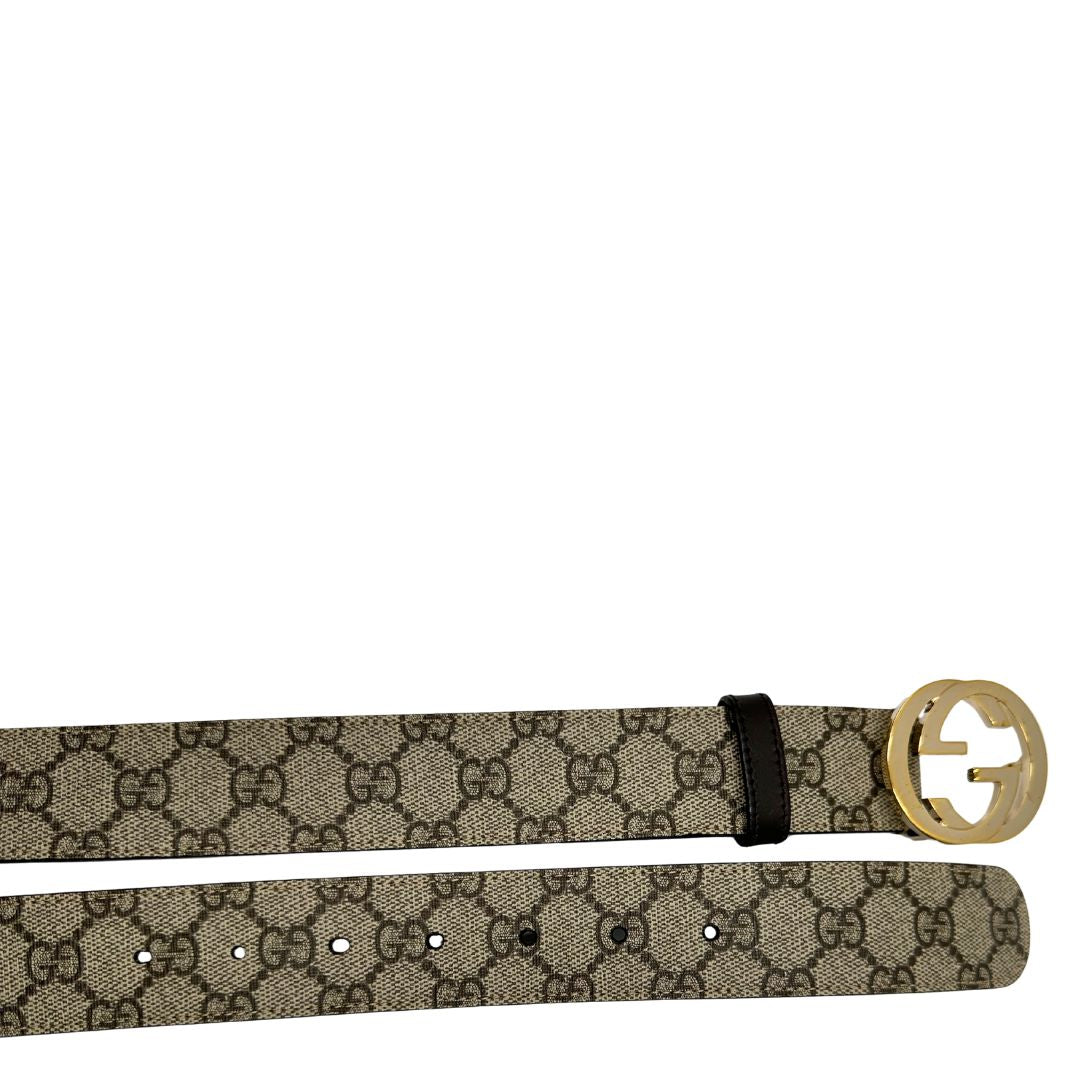 Cintura Gucci in canvas beige GG con finiture in pelle marroni e parti metalliche dorate. Completa di corredo, di lusso, originale, ottime condizioni, usata.