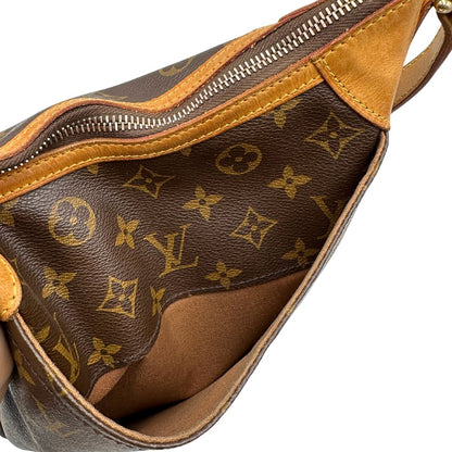 interno Borsa Odeon PM Louis Vuitton in canvas marrone monogram con finiture in vacchetta naturale e parti metalliche dorate. Dotata di tracolla regolabile con fibbia, di lusso, originale, buone condizioni, usata. 
