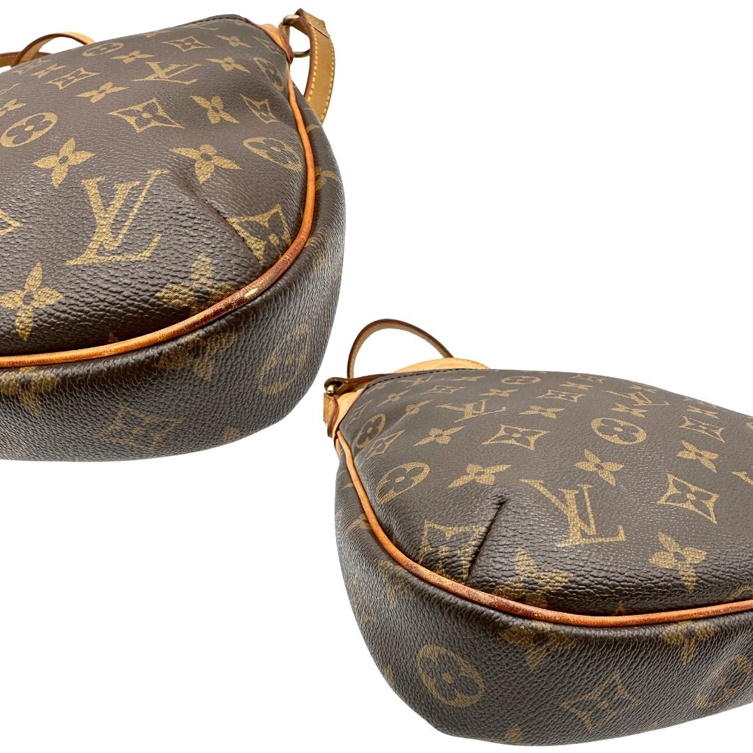 angoli Borsa Odeon PM Louis Vuitton in canvas marrone monogram con finiture in vacchetta naturale e parti metalliche dorate. Dotata di tracolla regolabile con fibbia, di lusso, originale, buone condizioni, usata.