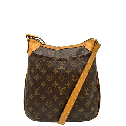 front Borsa Odeon PM Louis Vuitton in canvas marrone monogram con finiture in vacchetta naturale e parti metalliche dorate. Dotata di tracolla regolabile con fibbia, di lusso, originale, buone condizioni, usata. 
