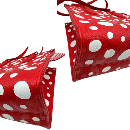 angoli  Borsa L.V. in pelle rossa monogram Empreinte con parti metalliche argentate; munita di doppi manici stondati e una tracolla amovibile e regolabile. Completa di corredo, di lusso, originale, ottime condizioni. 