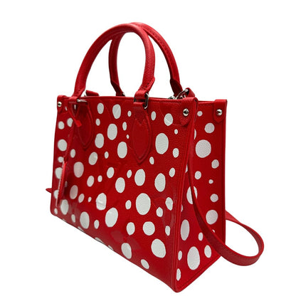 lato  Borsa L.V. in pelle rossa monogram Empreinte con parti metalliche argentate; munita di doppi manici stondati e una tracolla amovibile e regolabile. Completa di corredo, di lusso, originale, ottime condizioni. 