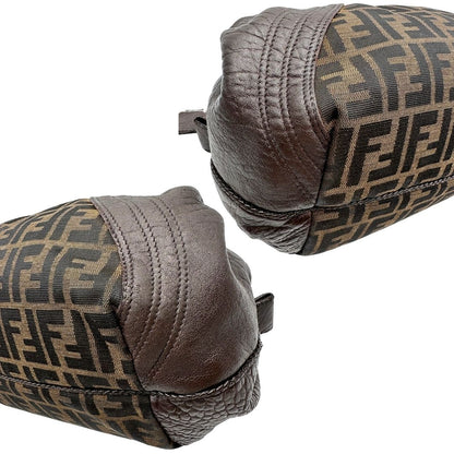 angoli Borsa Fendi in tessuto trama zucca con finiture in pelle marroni e parti metalliche dorate; munita di doppi manici stondati, di lusso, originale, ottime condizioni. 