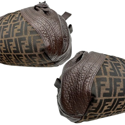 angoli Borsa Fendi in tessuto trama zucca con finiture in pelle marroni e parti metalliche dorate; munita di doppi manici stondati, di lusso, originale, ottime condizioni. 