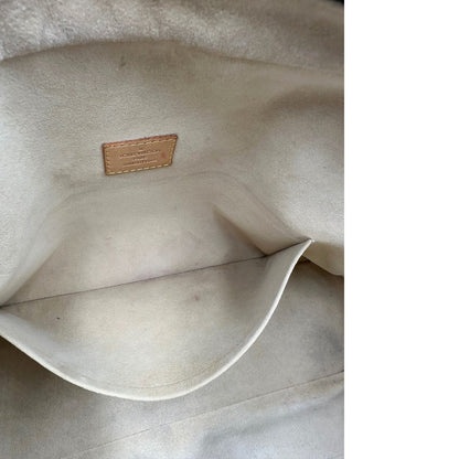 Tasca interna di una Borsa Louis Vuitton in canvas marrone monogram con finiture in vacchetta naturale e parti metalliche dorate; munita di doppi manici. Indossabile a mano. Originale, usata, di lusso in ottime condizioni