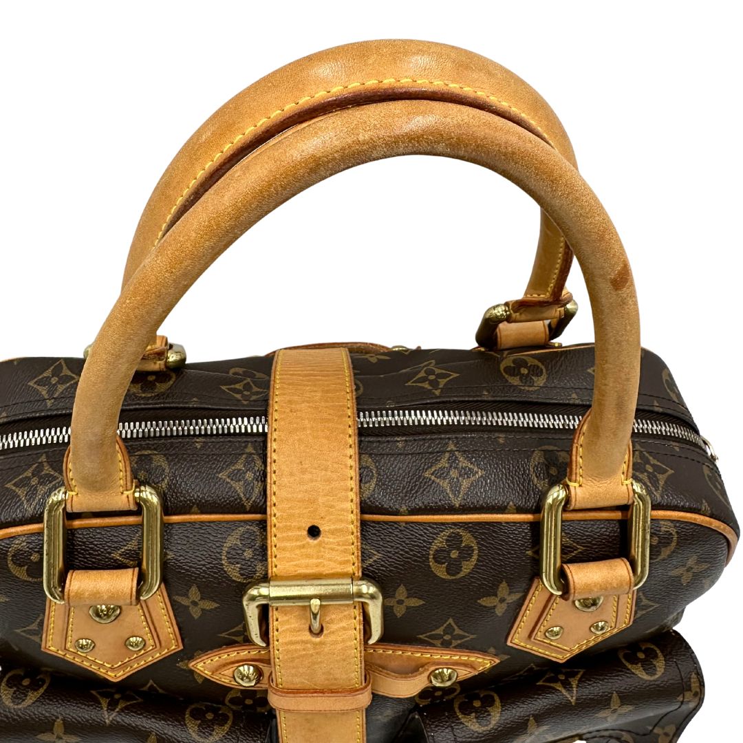 Manici di una Borsa Louis Vuitton in canvas marrone monogram con finiture in vacchetta naturale e parti metalliche dorate; munita di doppi manici. Indossabile a mano. Originale, usata, di lusso in ottime condizioni