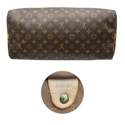 base e codice Borsa Louis Vuitton in canvas marrone monogram con finiture in vacchetta naturale e parti metalliche dorate; munita di doppi manici stondati. Completa di dustbag, lucchetto e chiave.
