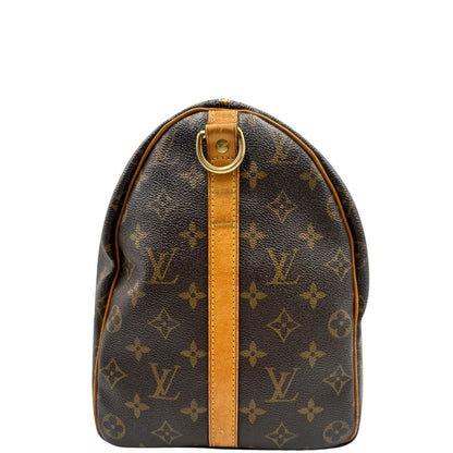 laterale della Borsa Louis Vuitton in canvas marrone monogram con finiture in vacchetta naturale e parti metalliche dorate; munita di doppi manici stondati. Completa di dustbag, lucchetto e chiave. 