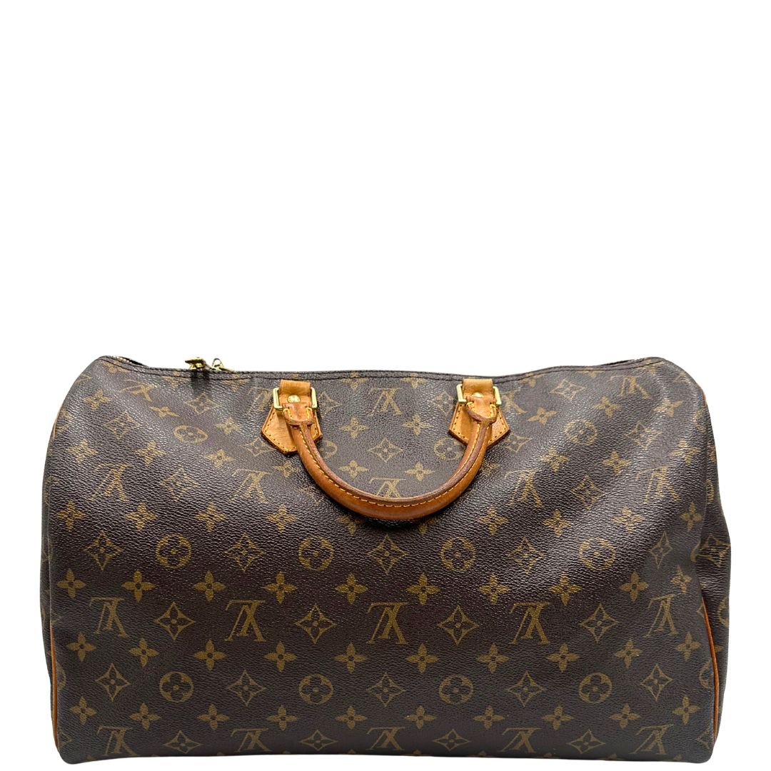 retro Borsa Louis Vuitton in canvas marrone monogram con finiture in vacchetta naturale e parti metalliche dorate; munita di doppi manici stondati. Completa di dustbag, lucchetto e chiave. 