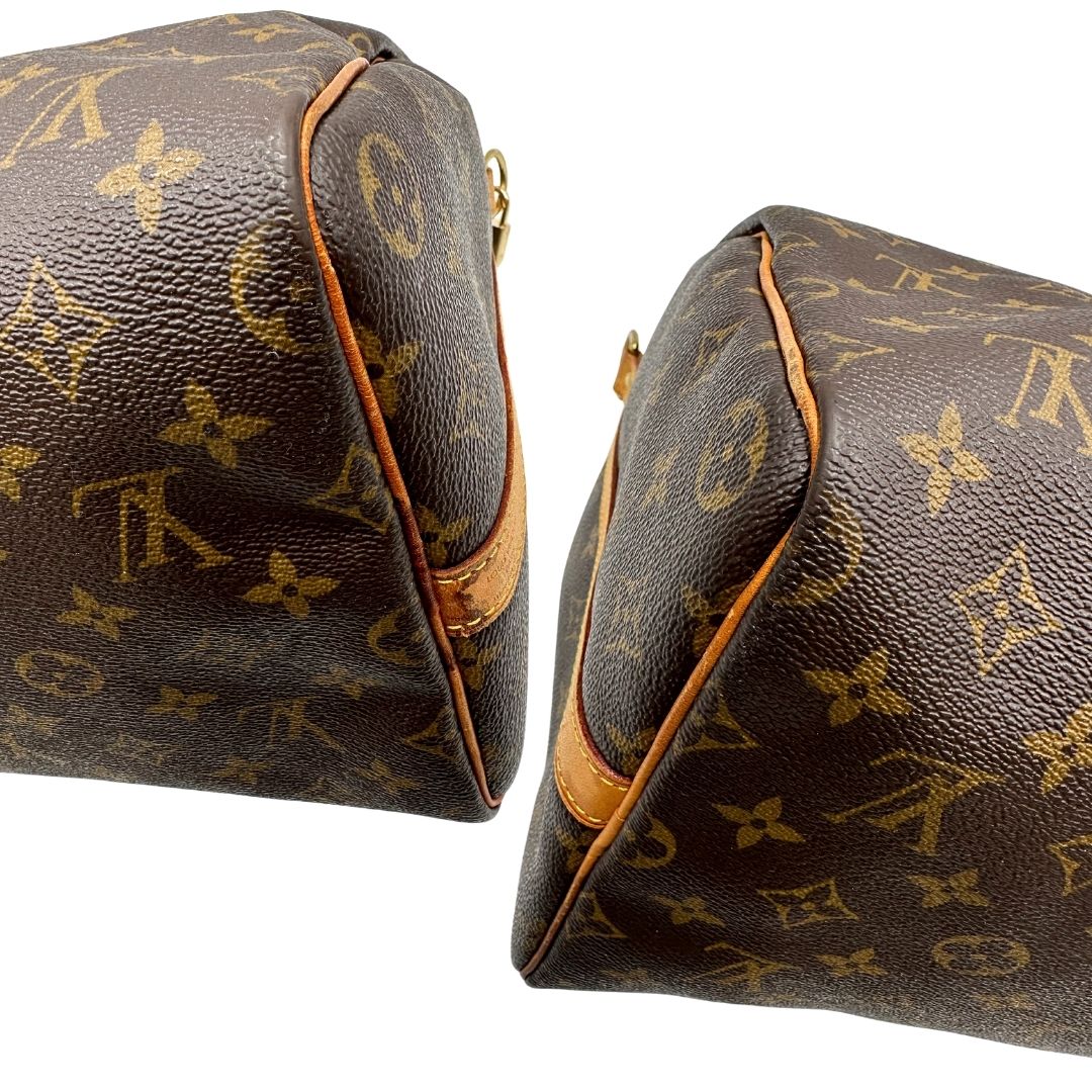 angoli Borsa Louis Vuitton in canvas marrone monogram con finiture in vacchetta naturale e parti metalliche dorate; munita di doppi manici stondati. Completa di dustbag, lucchetto e chiave. 