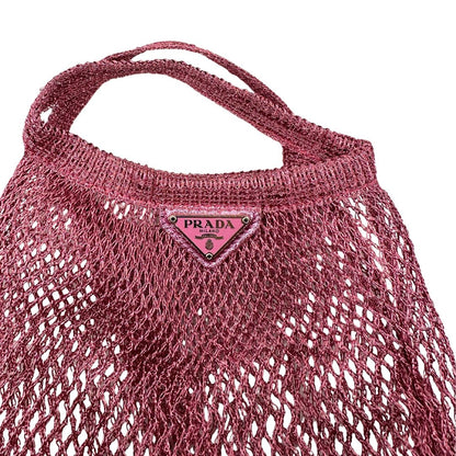  Borsa Prada in nylon effetto rete in maglia color rosa metallico con parti metalliche argentate. Completa di scatola, di lusso, eccellenti condizioni.