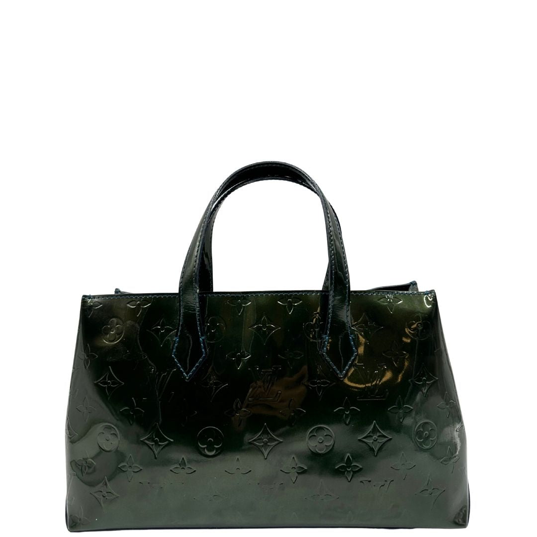 retro  Borsa Louis Vuitton in pelle verniciata color verde bottiglia e parti metalliche dorate; munita di doppi manici, da portare a mano. Completa di dustbag, di lusso, originale, ottime condizioni. 