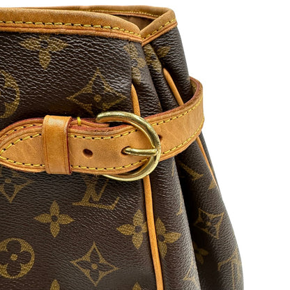 Difetto metalleria di una borsa LV in canvas marrone monogram con finiture in vacchetta naturale e dettagli metallici dorati. Dotata di dustbag.