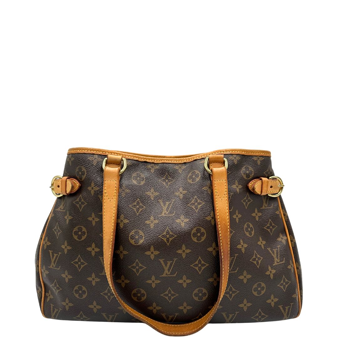 Retro di una borsa LV in canvas marrone monogram con finiture in vacchetta naturale e dettagli metallici dorati. Dotata di dustbag.