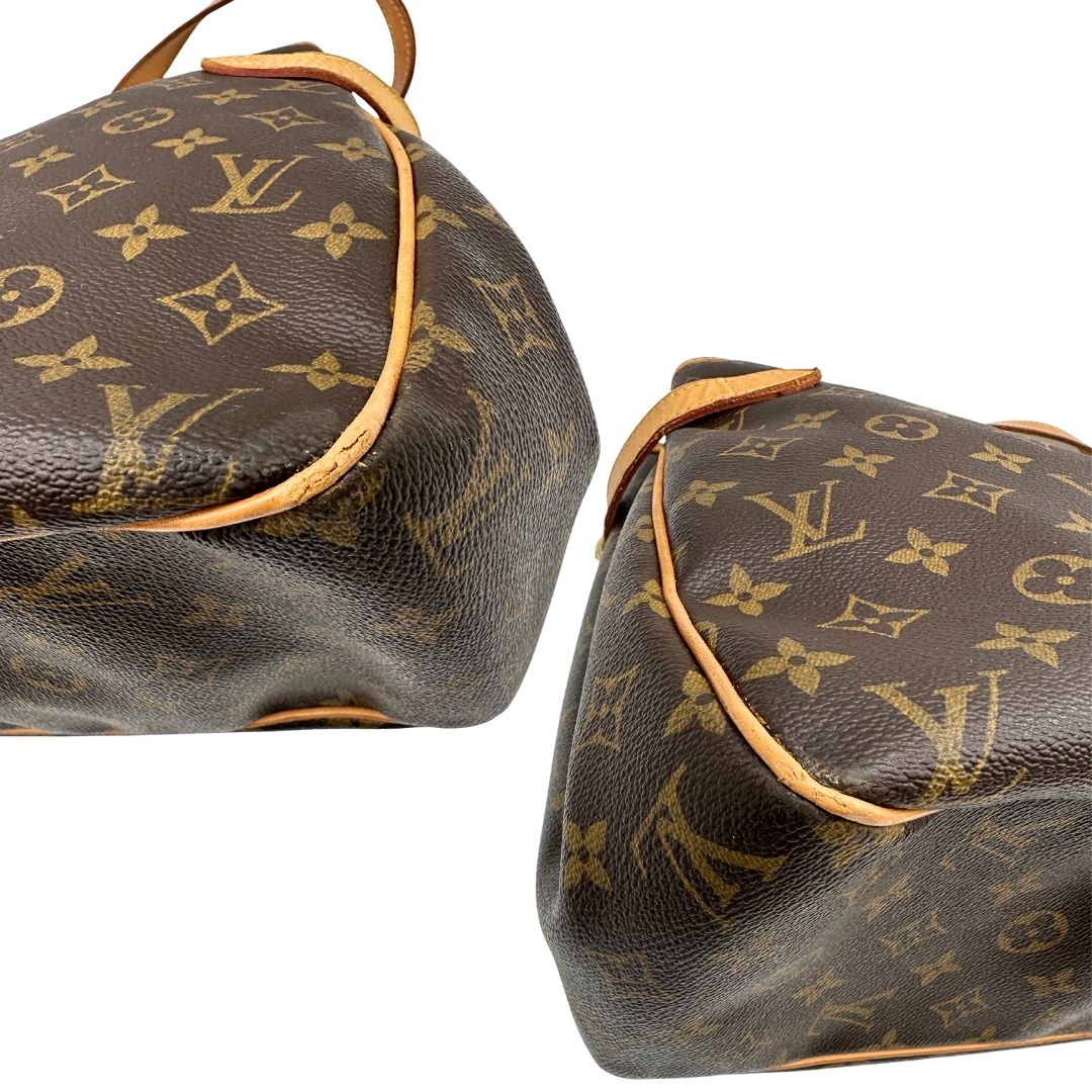 Angoli di una borsa LV in canvas marrone monogram con finiture in vacchetta naturale e dettagli metallici dorati. Dotata di dustbag.