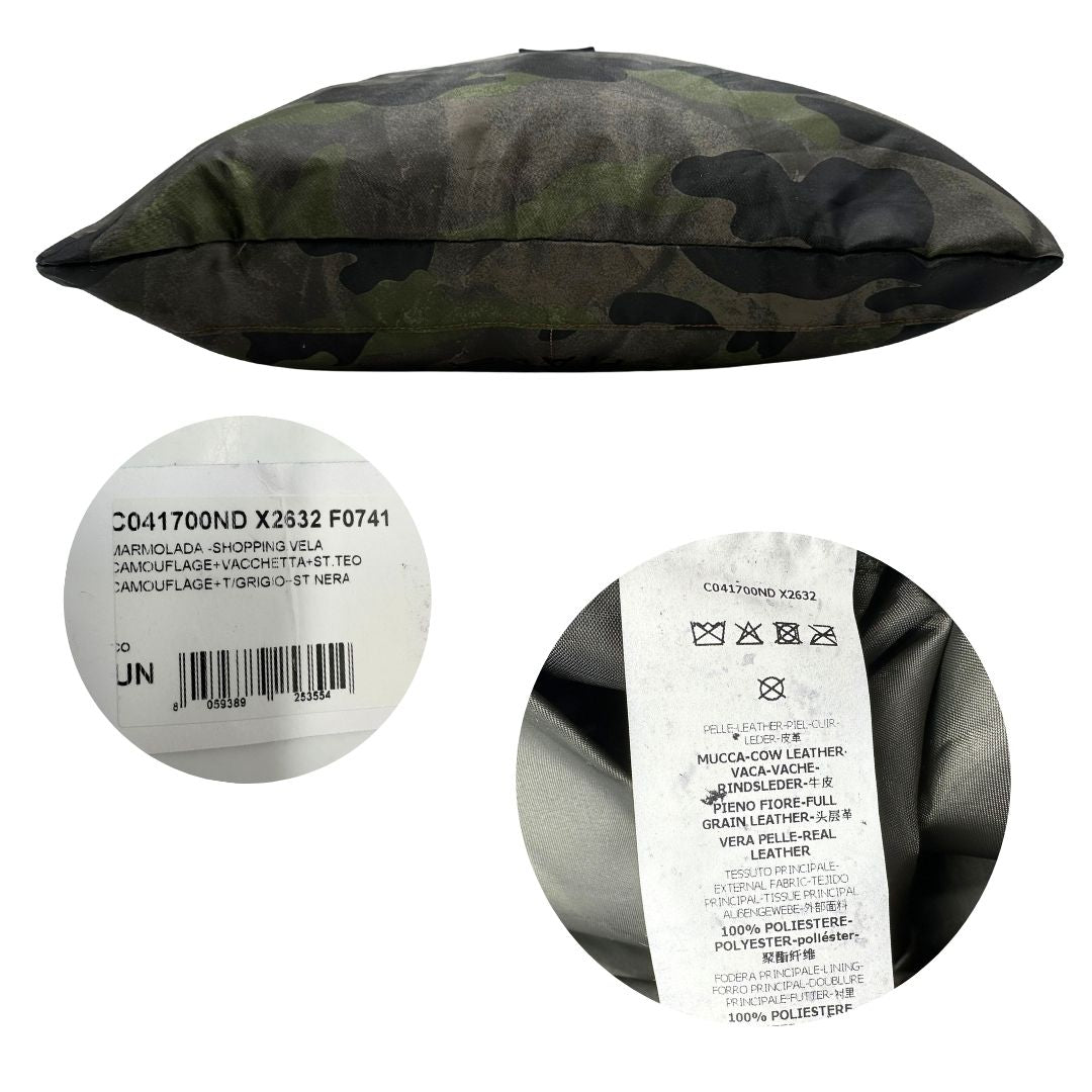 Base e codici di una tote Campomaggi in nylon trama camouflage, con finiture in pelle testa di moro e parti metalliche argentate. Munita di tracolla amovibile e regolabile. Completa di dustbag.