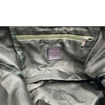 Interno di una tote Campomaggi in nylon trama camouflage, con finiture in pelle testa di moro e parti metalliche argentate. Munita di tracolla amovibile e regolabile. Completa di dustbag.