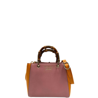 Front, Borsa Gucci in pelle martellata bicolor con lati a contrasto arancioni e corpo principale rosa e hardware dorato.