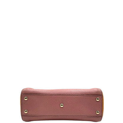 Base, Borsa Gucci in pelle martellata bicolor con lati a contrasto arancioni e corpo principale rosa e hardware dorato.