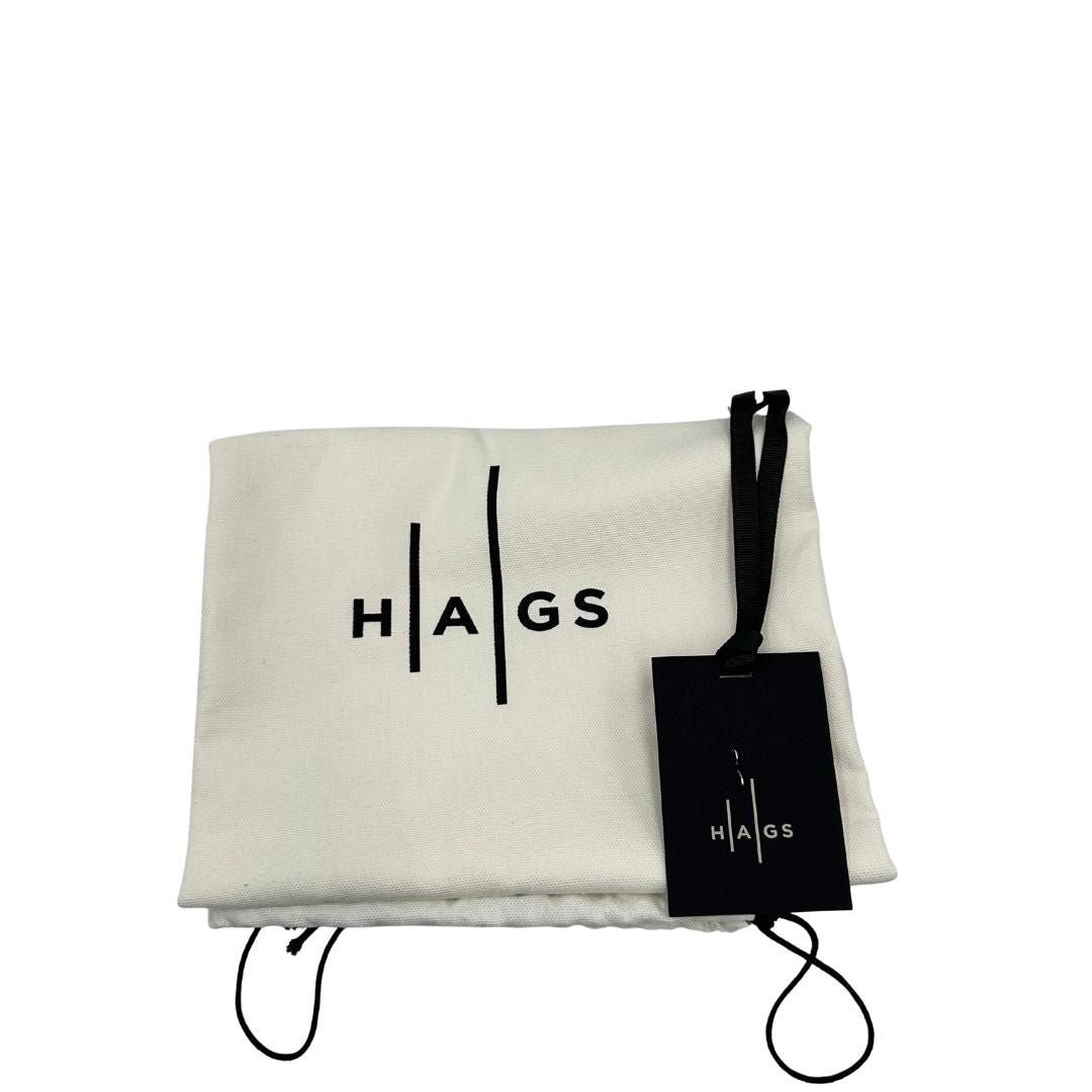 dustbag Borsa Hags in pelle nera con parti metalliche argentate; munita di una tracolla regolabile. Completa di dustbag e cartellino, di lusso, originale, eccellenti condizioni. 