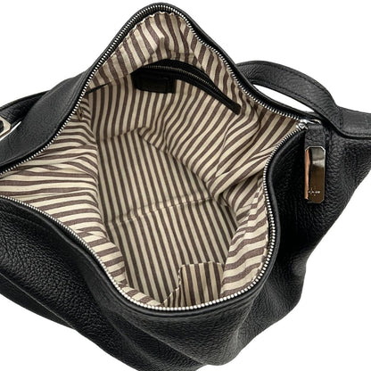 interno Borsa Hags in pelle nera con parti metalliche argentate; munita di una tracolla regolabile. Completa di dustbag e cartellino, di lusso, originale, eccellenti condizioni. 