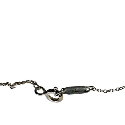 Collana Tiffany&Co. della collezione Return To Tiffany in argento 925 con lucchetto a forma di cuore. Completo di sacchetto antipolvere e busta, in ottime condizioni, originale.