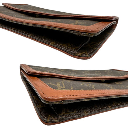 angoli Pochette Louis Vuitton in canvas marrone monogram con finiture in pelle marroni e parti metalliche dorate; da portare a mano, di lusso, originale, ottime condizioni, usata. 