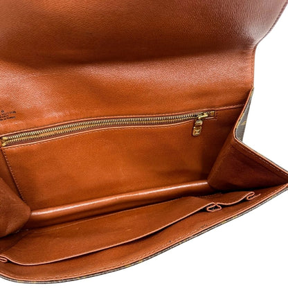 interno Pochette Louis Vuitton in canvas marrone monogram con finiture in pelle marroni e parti metalliche dorate; da portare a mano, di lusso, originale, ottime condizioni, usata. 