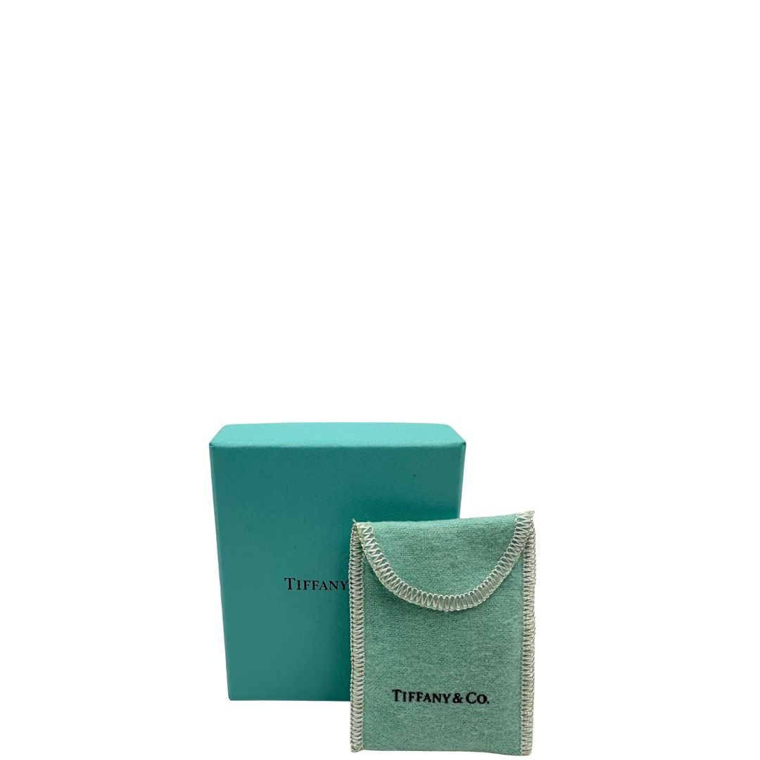 Bracciale Tiffany&Co. della collezione Return to Tiffany in argento 925 composto da sfere circolari e ciondolo cuore smaltato in verde Tiffany. Completo di scatola e sacchetto anti polvere.