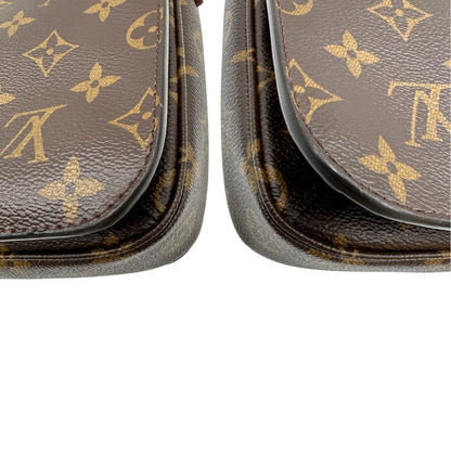 angoli Borsa Louis Vuitton Métis in canvas marrone monogram con dettagli in vacchetta naturale e parti metalliche dorate. Munita di un manico singolo e una tracolla regolabile e amovibile. Dotato di scatola e dustbag, di lusso, originale, ottime condizioni. 