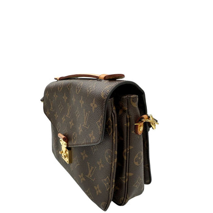 lato Borsa Louis Vuitton Métis in canvas marrone monogram con dettagli in vacchetta naturale e parti metalliche dorate. Munita di un manico singolo e una tracolla regolabile e amovibile. Dotato di scatola e dustbag, di lusso, originale, ottime condizioni. 