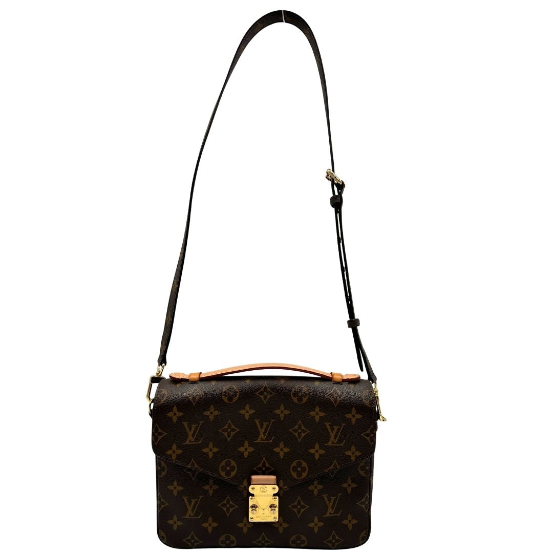 front Borsa Louis Vuitton Métis in canvas marrone monogram con dettagli in vacchetta naturale e parti metalliche dorate. Munita di un manico singolo e una tracolla regolabile e amovibile. Dotato di scatola e dustbag, di lusso, originale, ottime condizioni. 