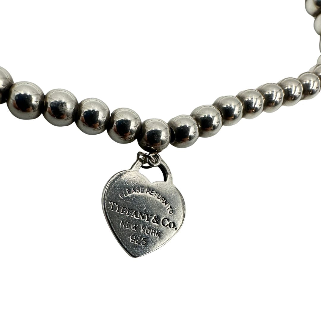 Bracciale Heart Tag Tiffany&Co. della collezione Return To Tiffany in argento 925 con ciondolo cuore. Completo di sacchetto antipolvere, di lusso, originale, ottime condizioni, usata.