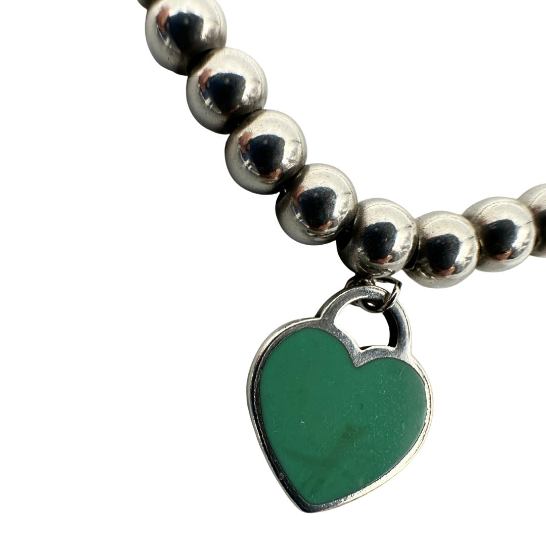 Bracciale Heart Tag Tiffany&Co. della collezione Return To Tiffany in argento 925 con ciondolo cuore. Completo di sacchetto antipolvere, di lusso, originale, ottime condizioni, usata.