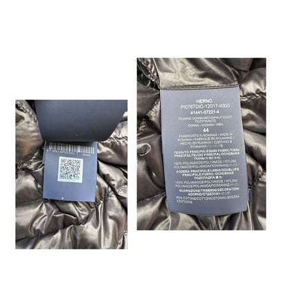 Piumino Herno in 100% poliammide nero con parti metalliche dorate, caratterizzato da imbottitura trapuntata, di lusso, originale, usato.