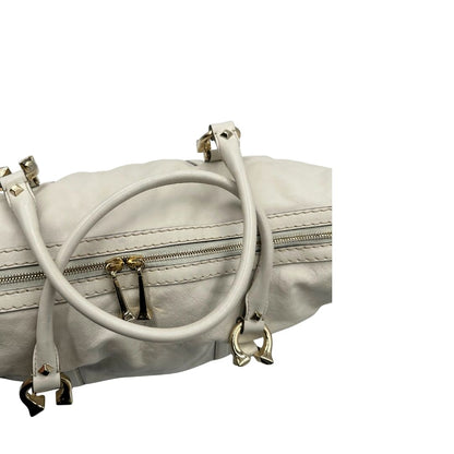 Manici di un Bauletto Gucci in pelle bianco avorio parti metalliche dorate, munita di due manici stondati. Indossabile a mano. Originale, usato, di lusso, in ottime condizioni.