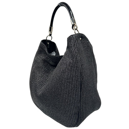 lato Borsa Saint Laurent in rafia nera con finiture in pelle tono su tono verniciata e parti metalliche argentate; munita di un manico rigido, indossabile a spalla, di lusso, originale, ottime condizioni, usata. 