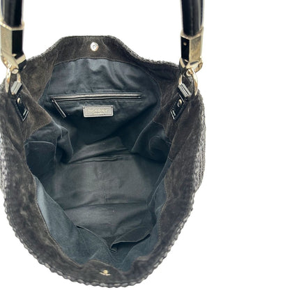 interno Borsa Saint Laurent in rafia nera con finiture in pelle tono su tono verniciata e parti metalliche argentate; munita di un manico rigido, indossabile a spalla, di lusso, originale, ottime condizioni, usata. 