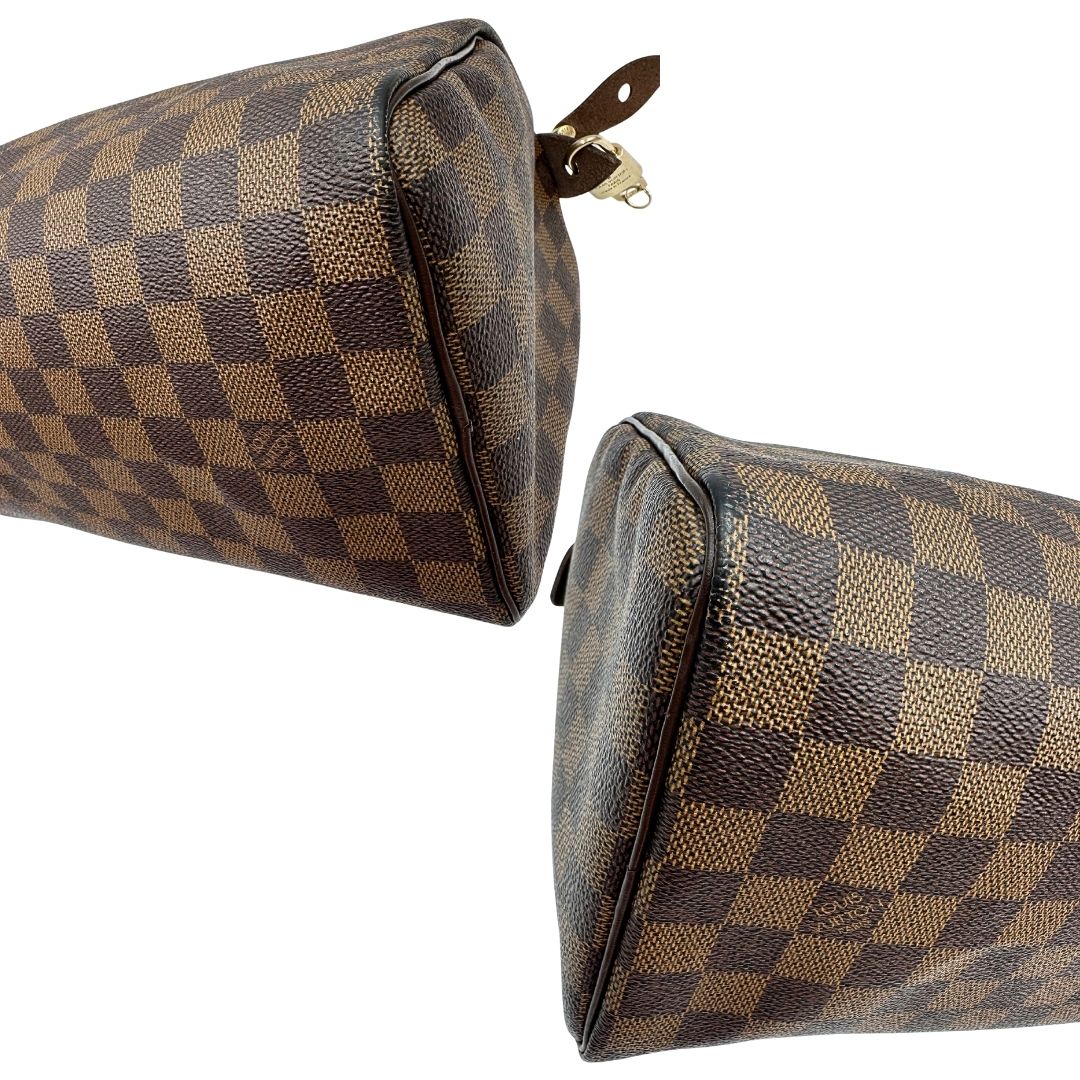 Angoli di una borsa Louis Vuitton in canvas Damier Ébène con parti metalliche dorate; munita di doppi manici stondati, da portare a mano. Completo di scatola logata, lucchetto e chiavi.