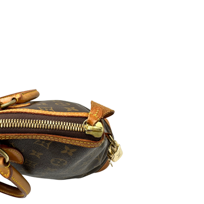 Borsa Louis Vuitton in canvas marrone monogram con finiture in vacchetta naturale e parti metalliche dorate. Munita di doppi manici stondati. Completa di dustbag, lucchetto e chiavi. Originale, usata, di lusso, in ottime condizioni.